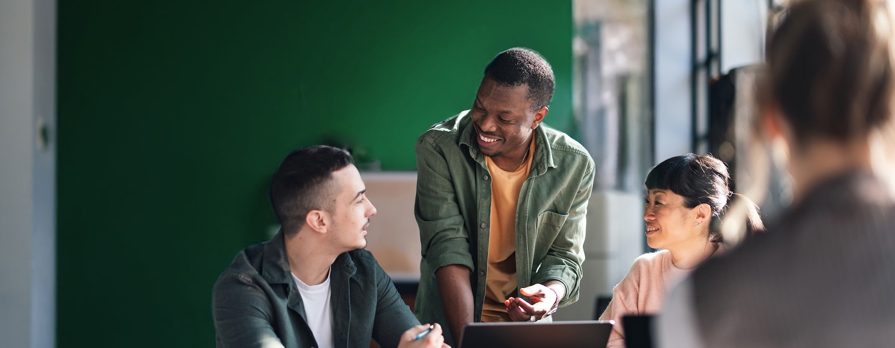 a group of people sitting around a table